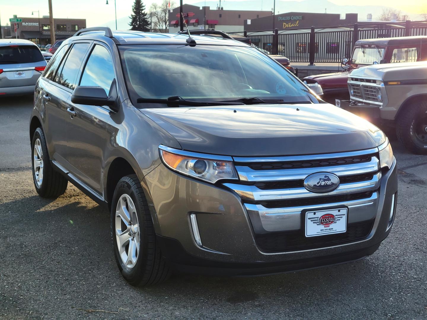 2013 Grey /Gray Ford Edge SEL (2FMDK4JC9DB) with an 3.5L V6 engine, 6-Speed Automatic transmission, located at 450 N Russell, Missoula, MT, 59801, (406) 543-6600, 46.874496, -114.017433 - Nice All Wheel Drive. Air. Cruise. Tilt. Power Windows and Locks. Bluetooth. Nice Cooper Tires. - Photo#3